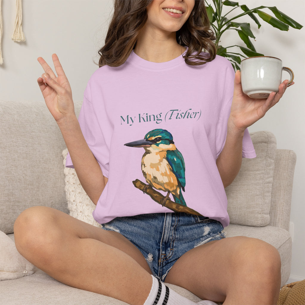 Lavender crewneck t-shirt with kingfisher graphic, worn while seated