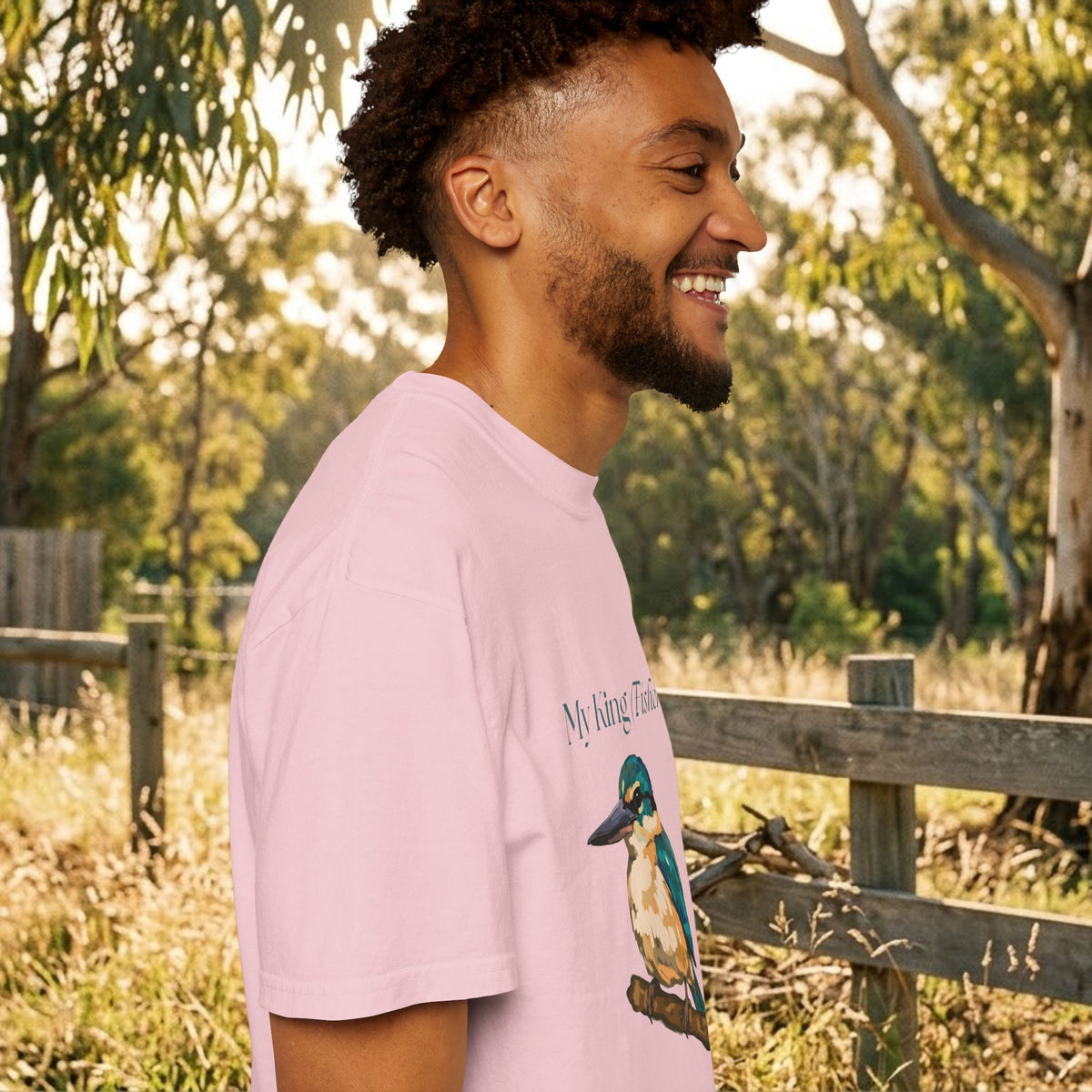 Light pink crewneck T-shirt with kingfisher bird graphic, side view