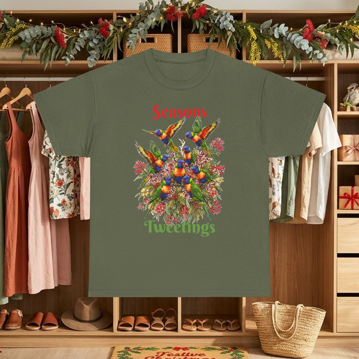 Forest green T-shirt with colorful birds floral graphic and text "Seasons Tweettings"