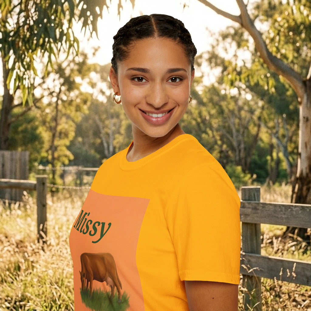 Orange cow graphic T-shirt with Missy text, side view on model