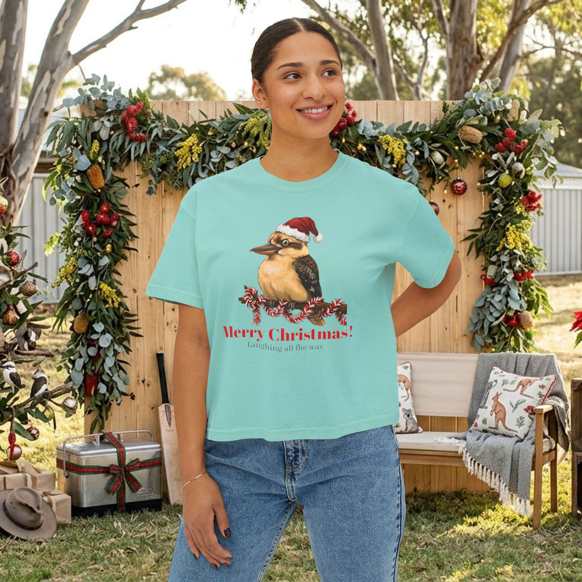 Turquoise Christmas T-shirt with kookaburra wearing a Santa hat graphic on the front