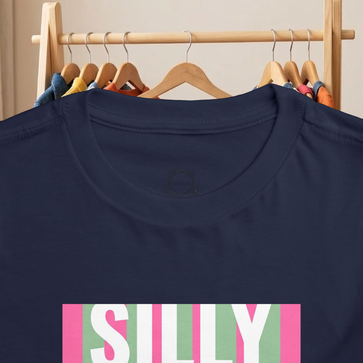 Toddler tee, navy short-sleeve with “SILLY” colorful graphic print on front