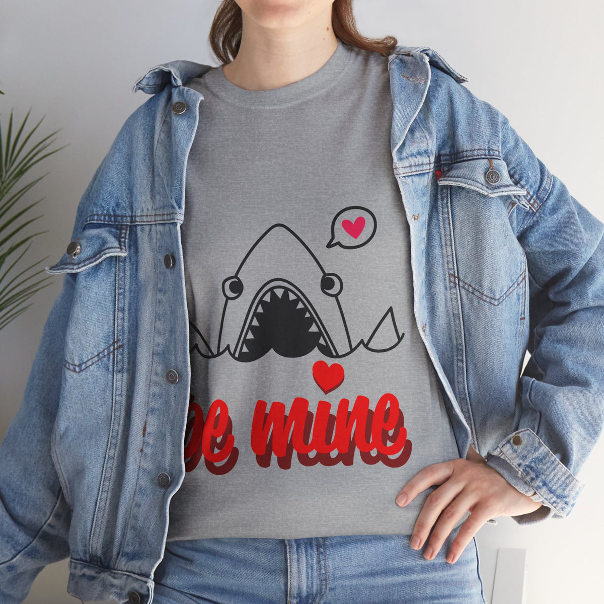 Close-up of heather gray shark T-shirt with red "be mine" lettering and heart