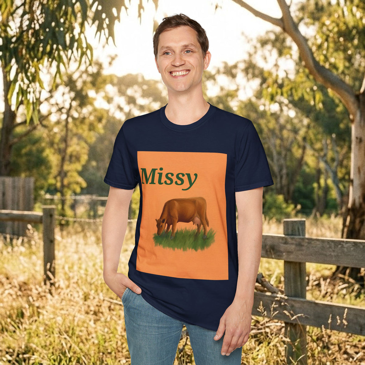 Navy graphic t-shirt with 'Missy' name and brown cow grazing in orange square