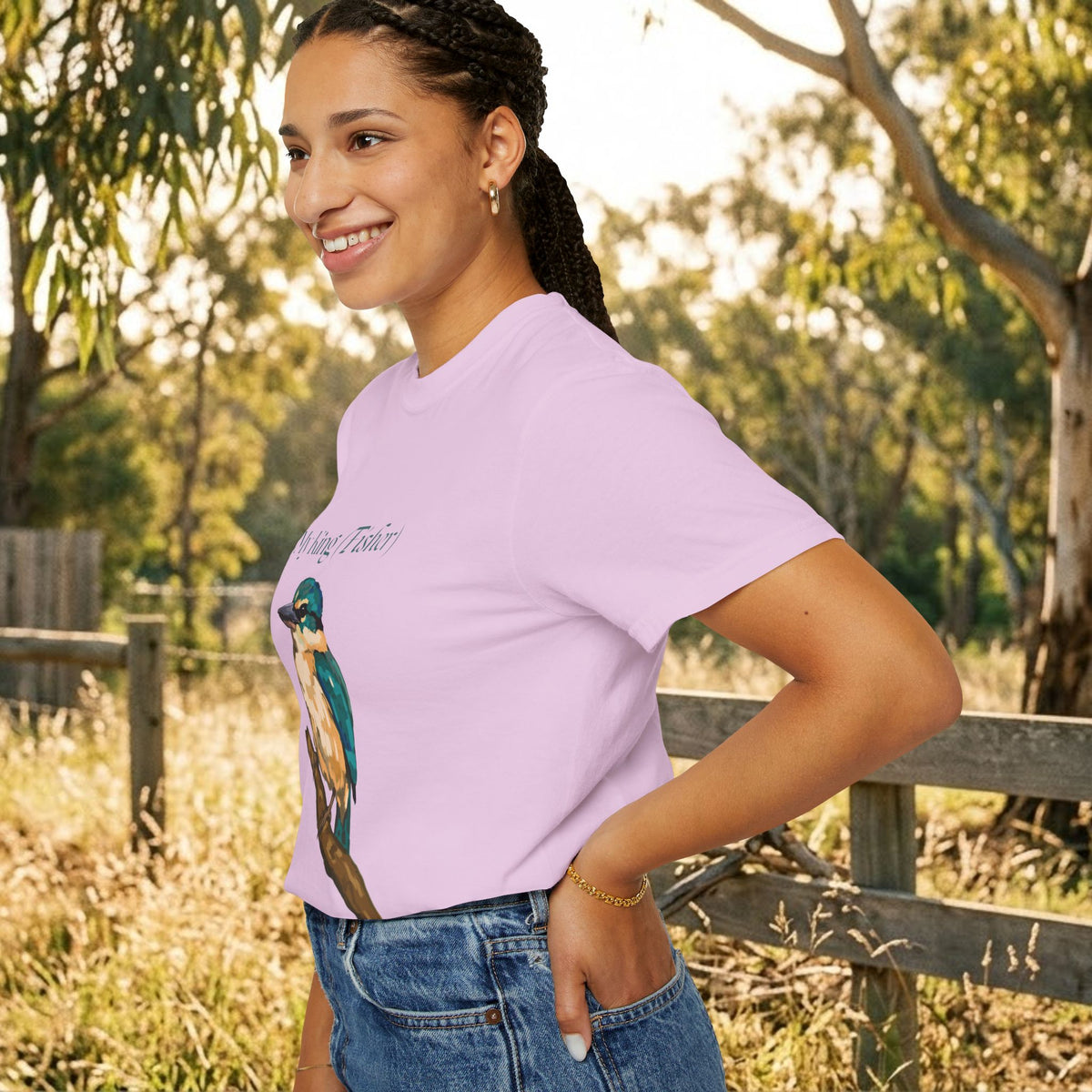 Lavender short-sleeve T-shirt with kingfisher bird graphic on front, side view.
