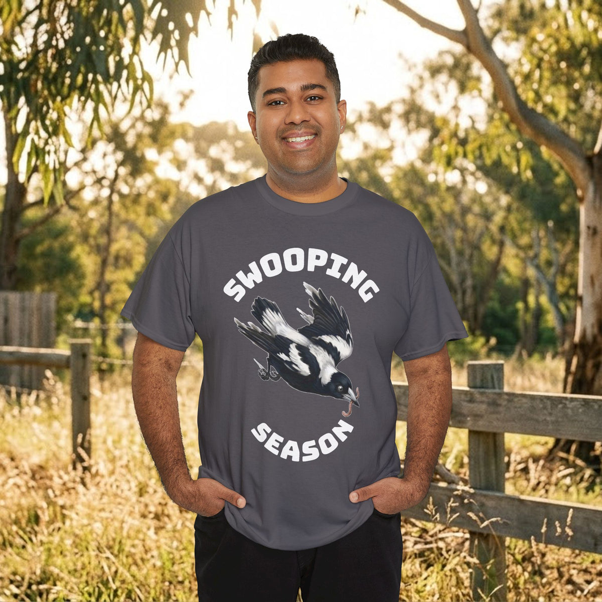 Charcoal/dark gray bird graphic t-shirt with flying bird and bold text