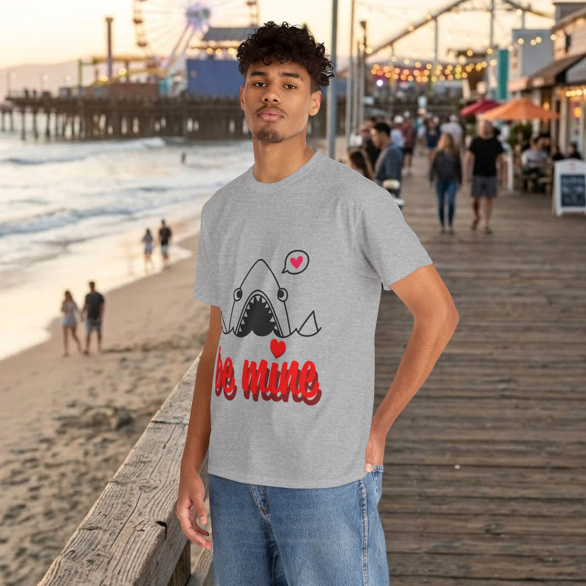 Heather gray t-shirt with shark graphic and red "be mine" text, worn with jeans.
