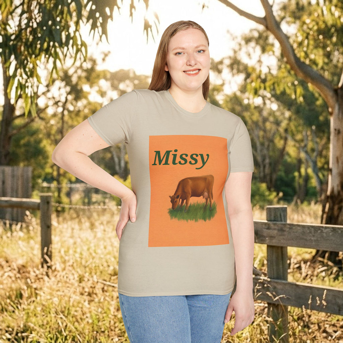 Light cream short-sleeve T-shirt with orange 'Missy' square and grazing cow