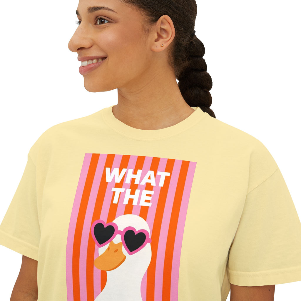 Butter crew-neck graphic tee with “WHAT THE” text and duck wearing heart glasses