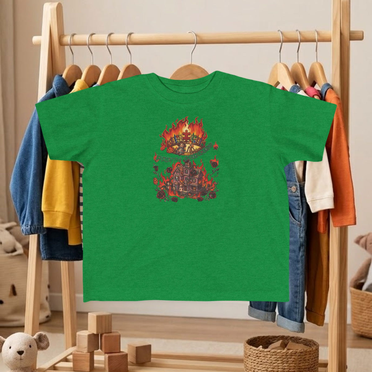 Toddler tee in green with colorful fire graphic and medieval ruins illustration