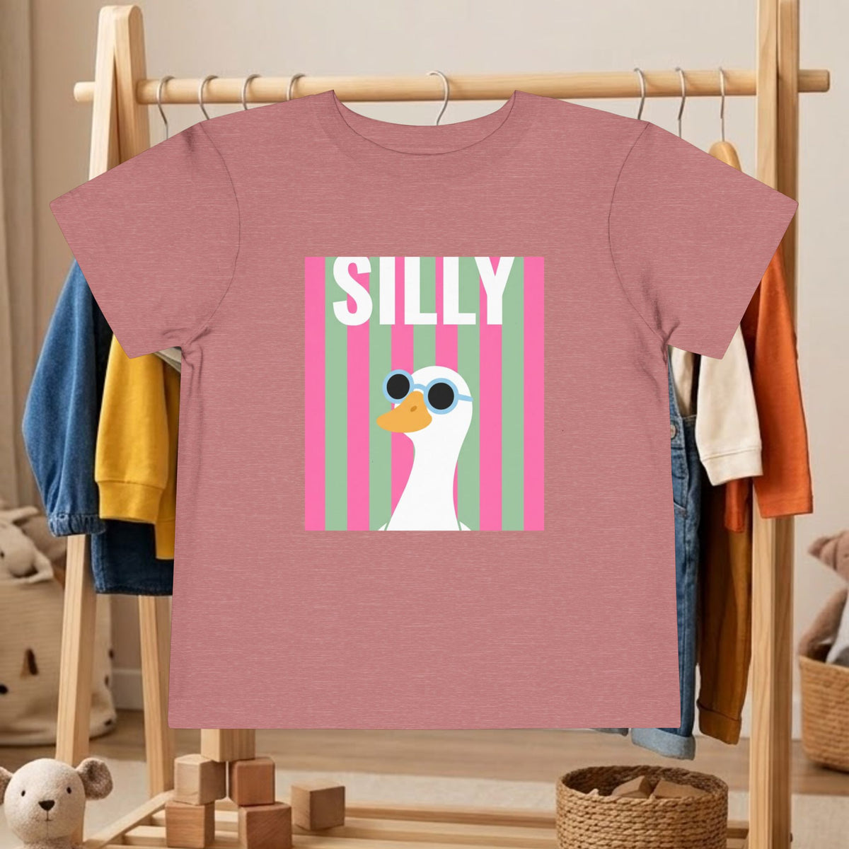 Toddler mauve tee with “SILLY” and duck wearing sunglasses graphic