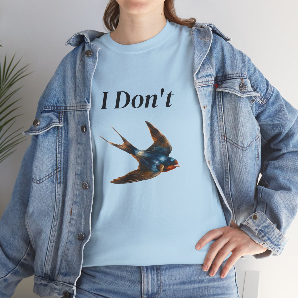 Light blue graphic T-shirt with “I Don’t” text and bird illustration print