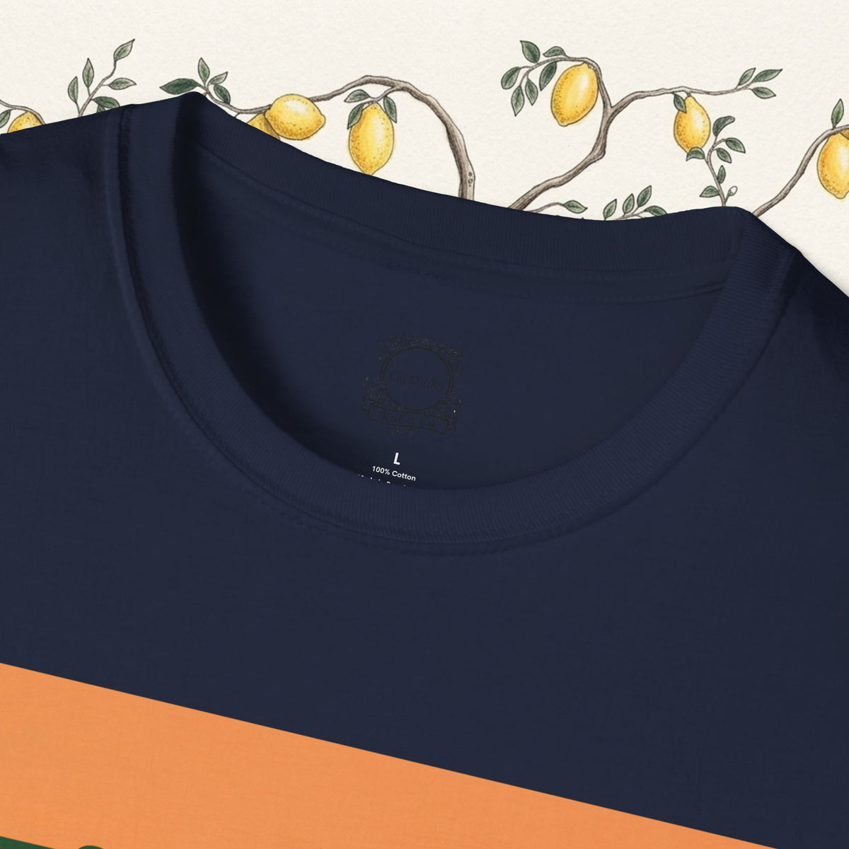 Navy T-shirt neckline close-up with small chest tag and subtle print