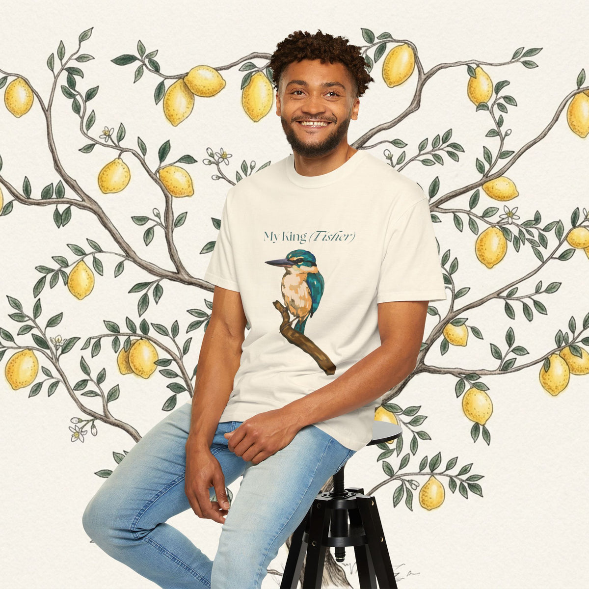 White kingfisher graphic T-shirt with bird illustration and text on chest