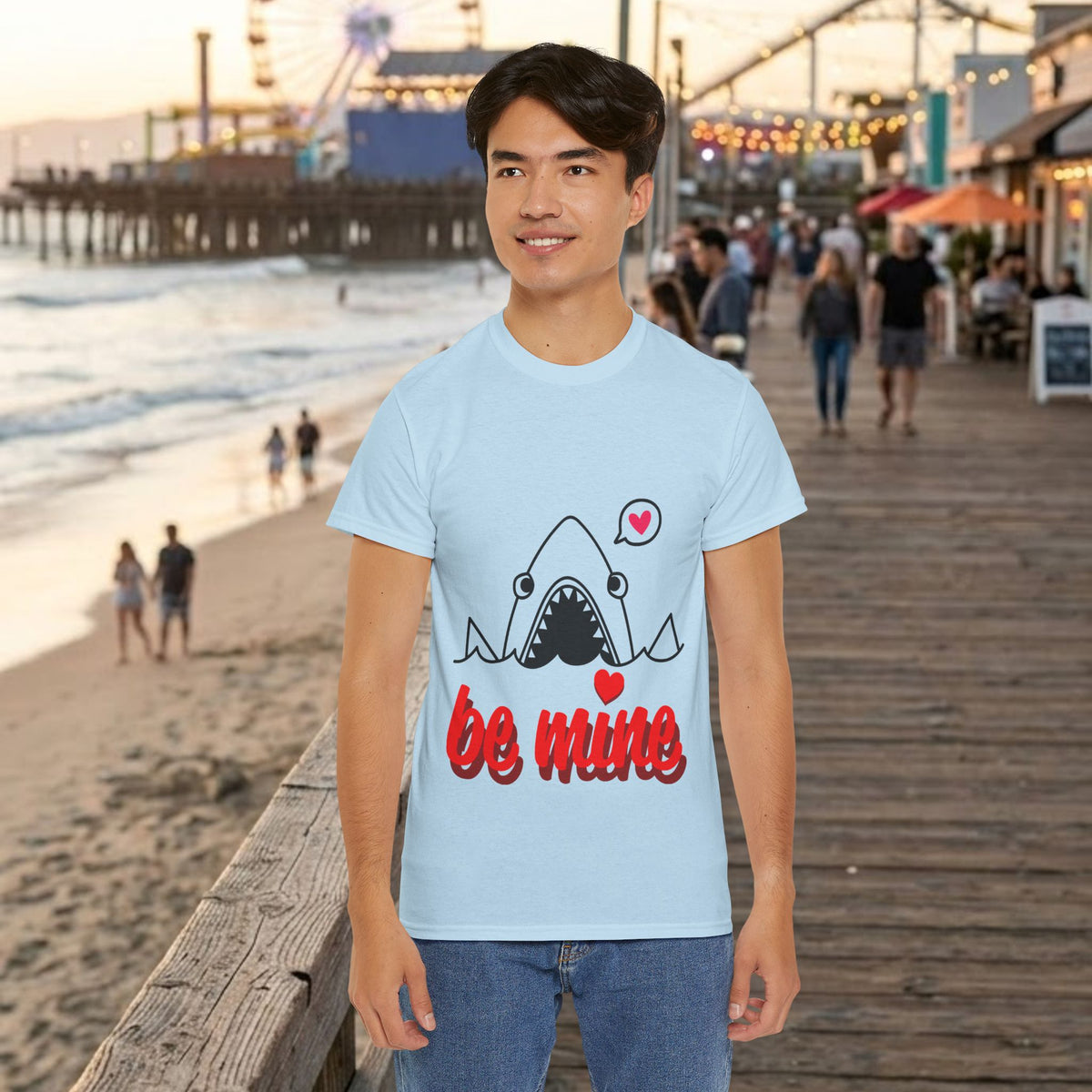 Light blue T-shirt featuring a cartoon shark and red “be mine” graphic, crew neck