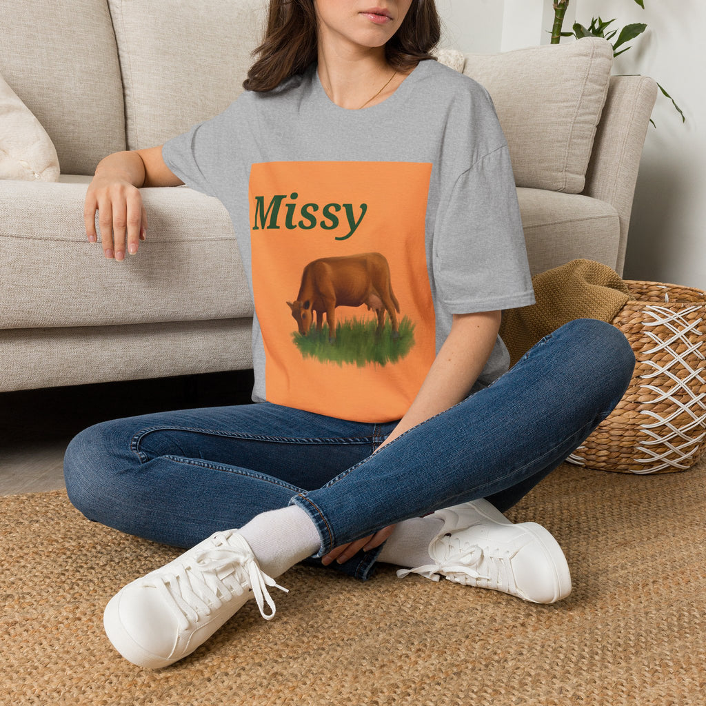 Heather grey crew-neck T-shirt with orange cow graphic and “Missy” text