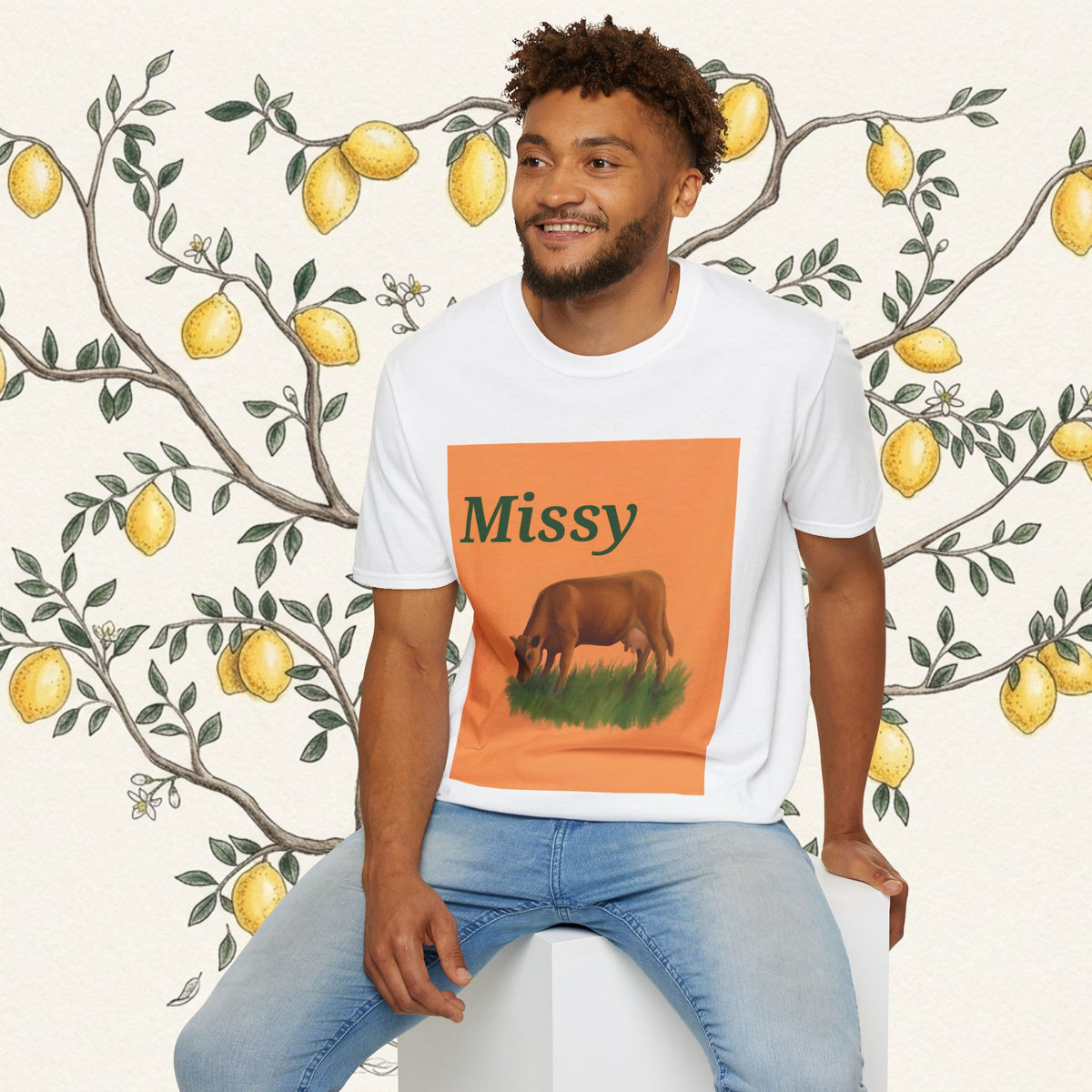 White cow graphic t-shirt with 'Missy' and grazing cow artwork, full front
