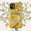 Yellow tough phone case with lemon, lime and cocktail illustration; raised camera cutout.