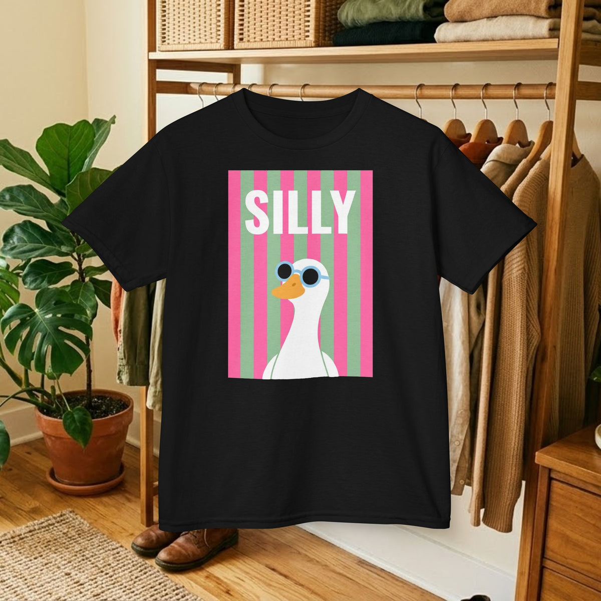 Black kids T-shirt with SILLY duck graphic in pink striped panel