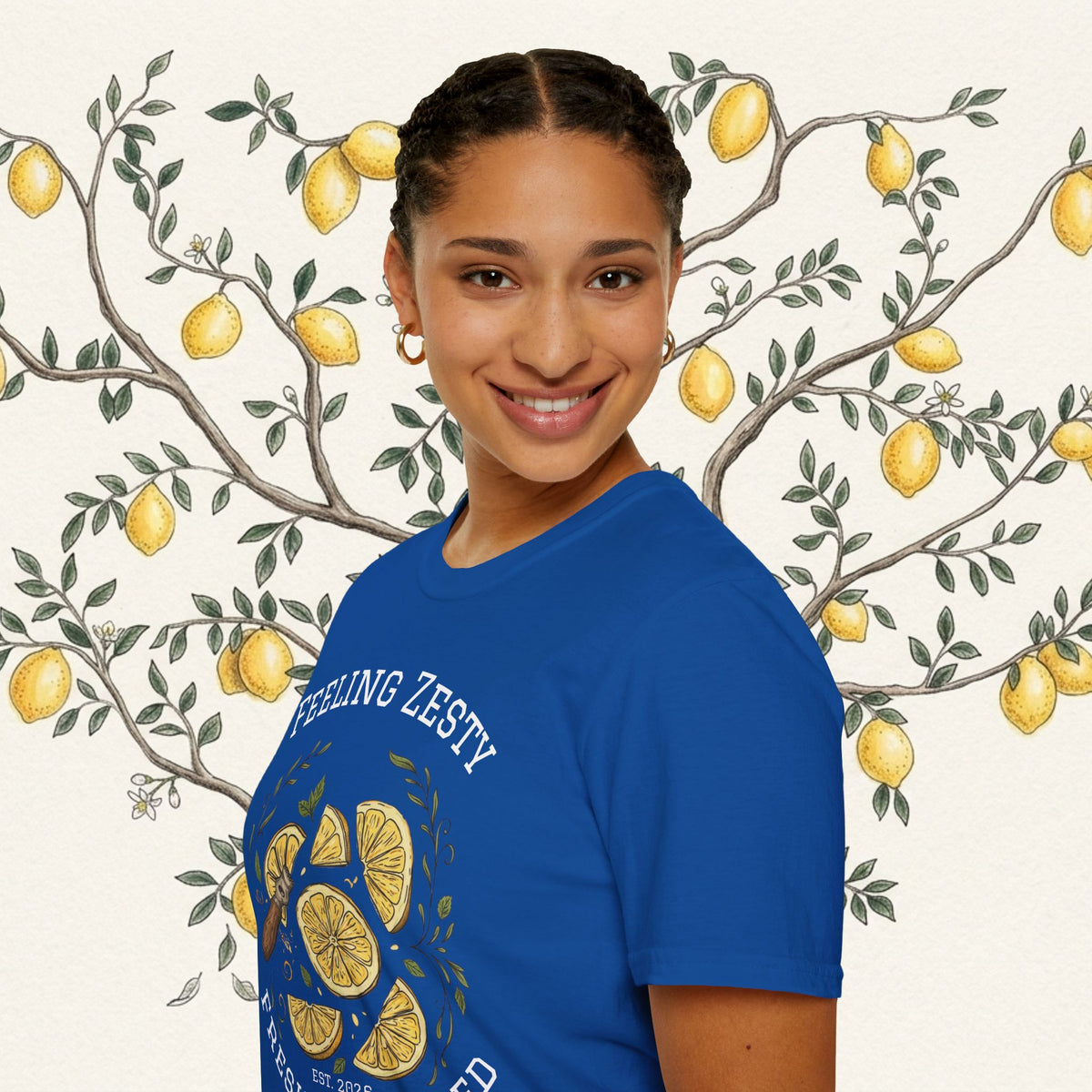 Blue crewneck graphic tee with partial “FEELING ZESTY” text
