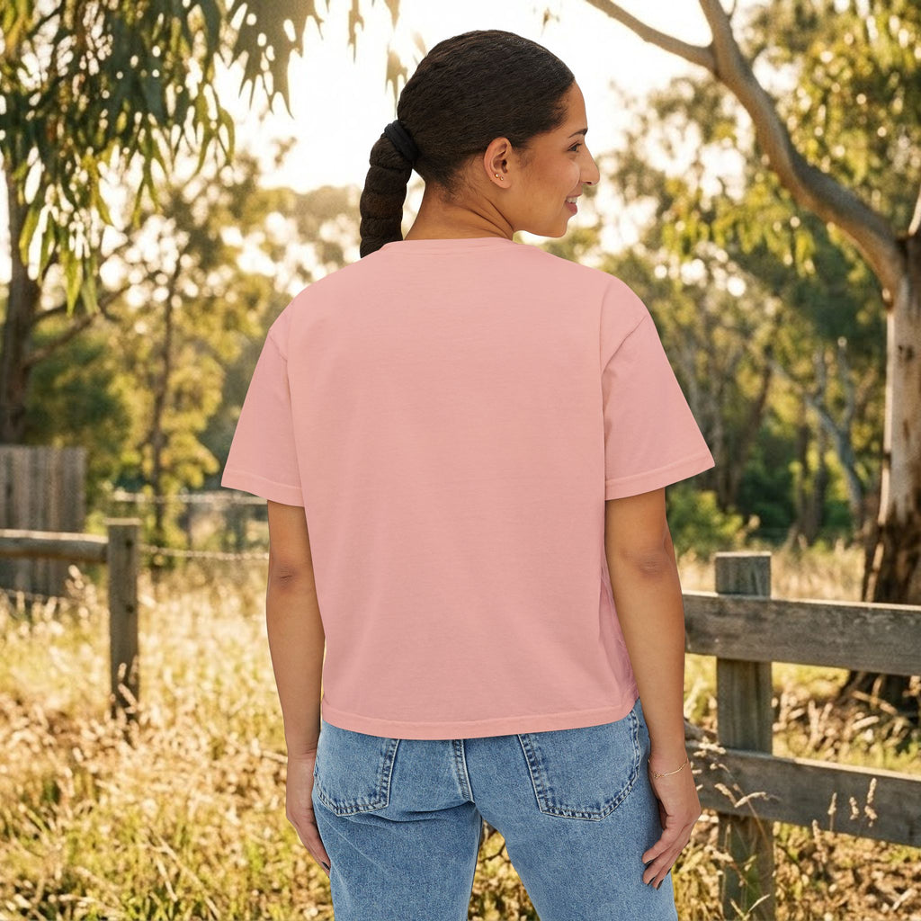 Women’s boxy tee in peach pink, plain back with crew neck and short sleeves.