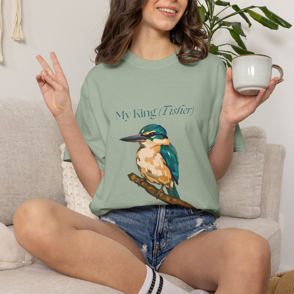 Green kingfisher graphic T-shirt with crew neckline, model seated