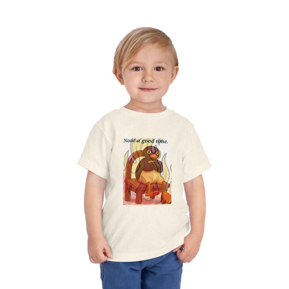 White toddler T-shirt on child with cat-in-flames graphic and “Need a good time” text