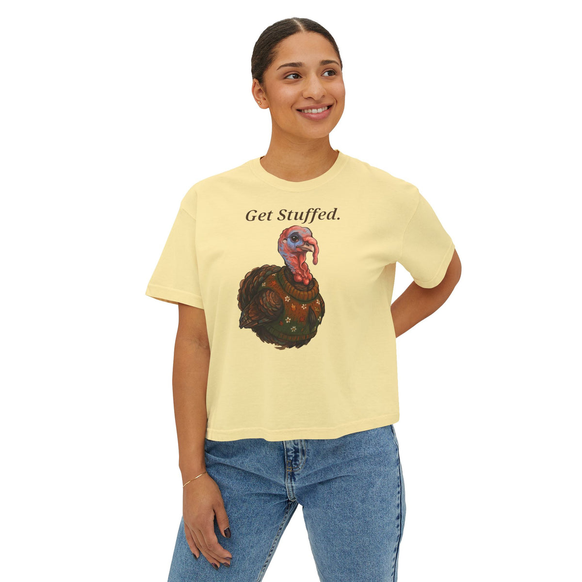 Butter yellow crewneck T-shirt with "Get Stuffed." turkey graphic, worn by model.