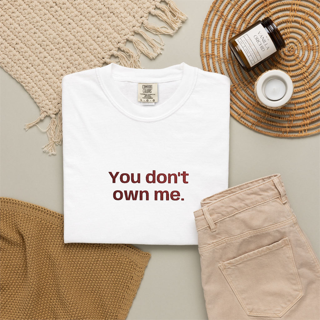 Off-white graphic T-shirt with bold text "You don't own me." on the front.