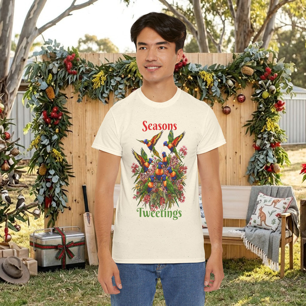Cream T-shirt with colorful bird floral holiday graphic and 'Seasons Tweetings' text