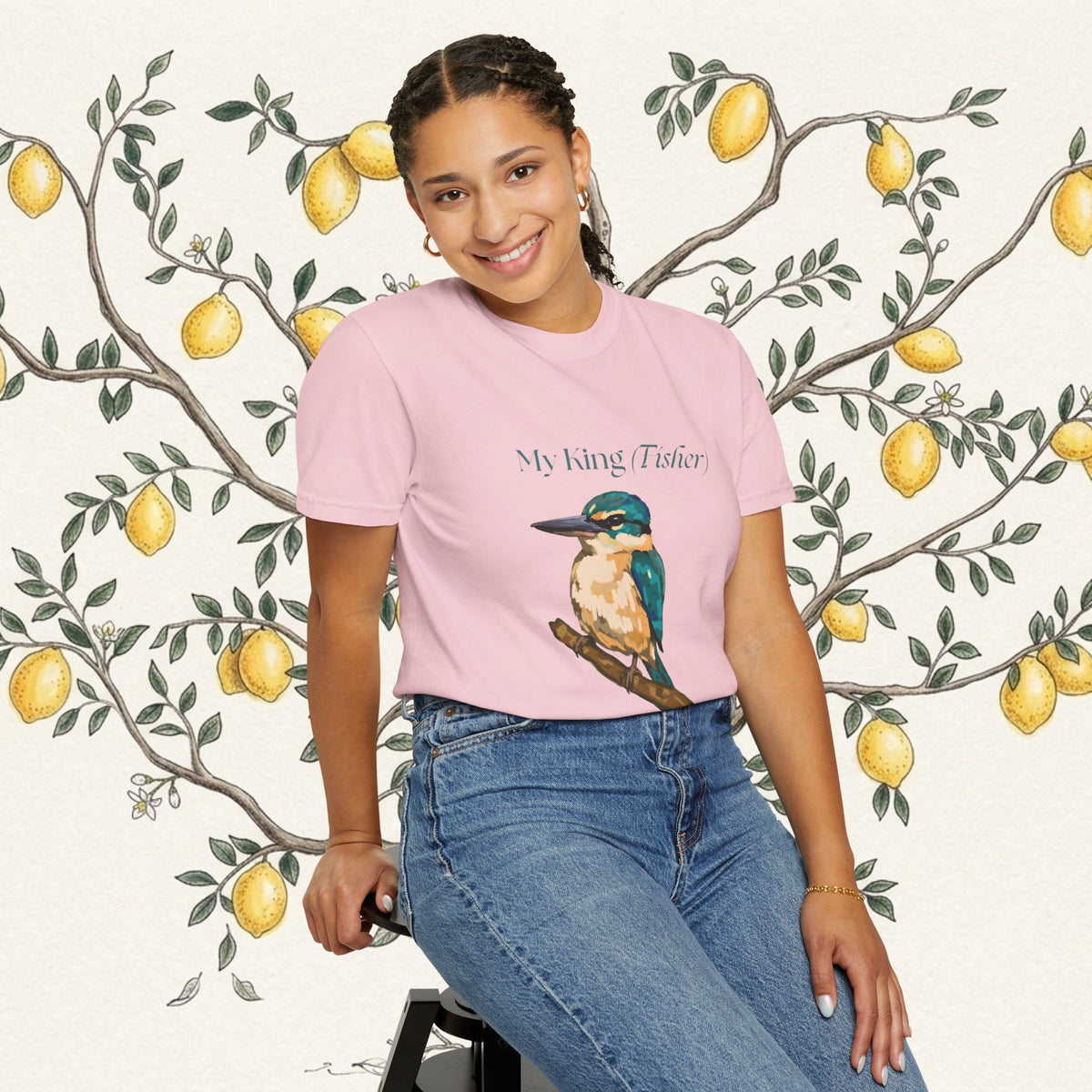 Light pink crewneck T-shirt with kingfisher bird graphic and logo text, front view