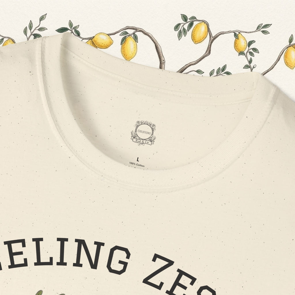 Cream tee back neckline with small logo patch and size label
