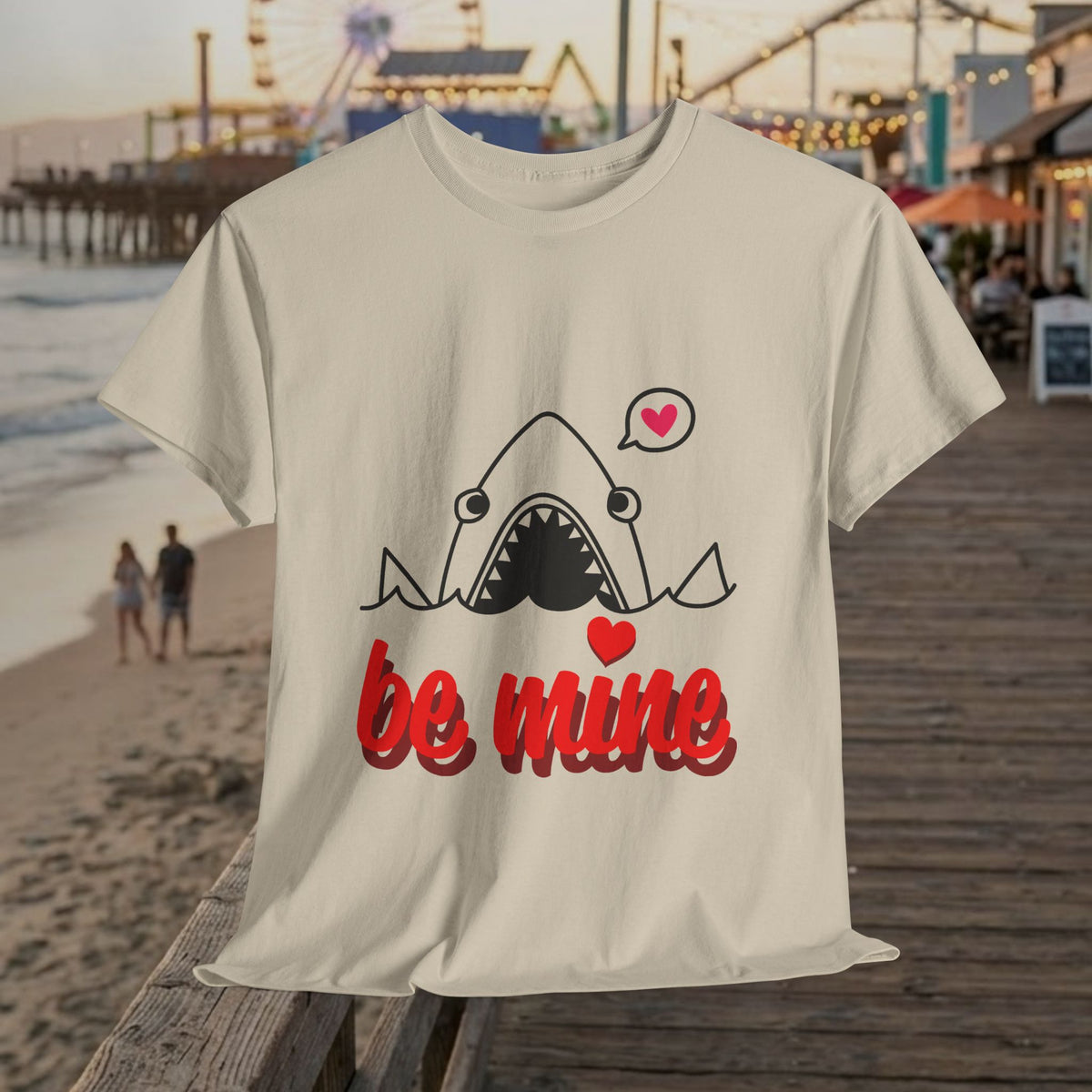 Sand-colored crewneck graphic T-shirt with shark illustration and red “be mine” text