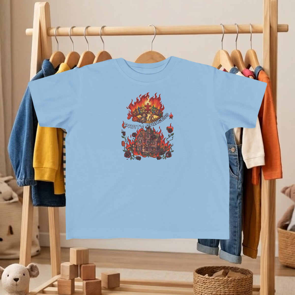 Toddler tee in powder blue with colorful fire graphic on the chest