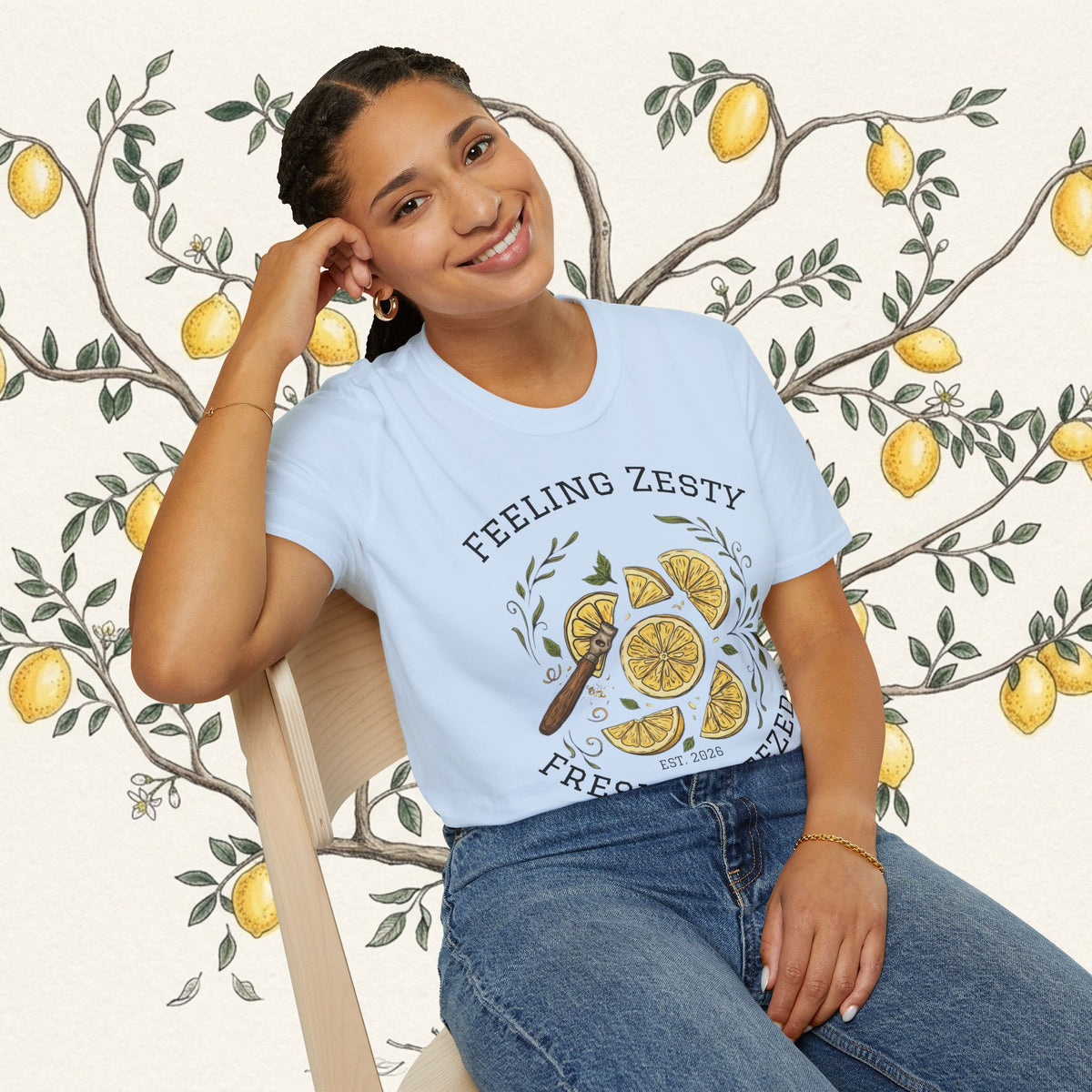 Light blue crewneck graphic tee on model, front view of citrus print and "FRESH SQUEEZED"