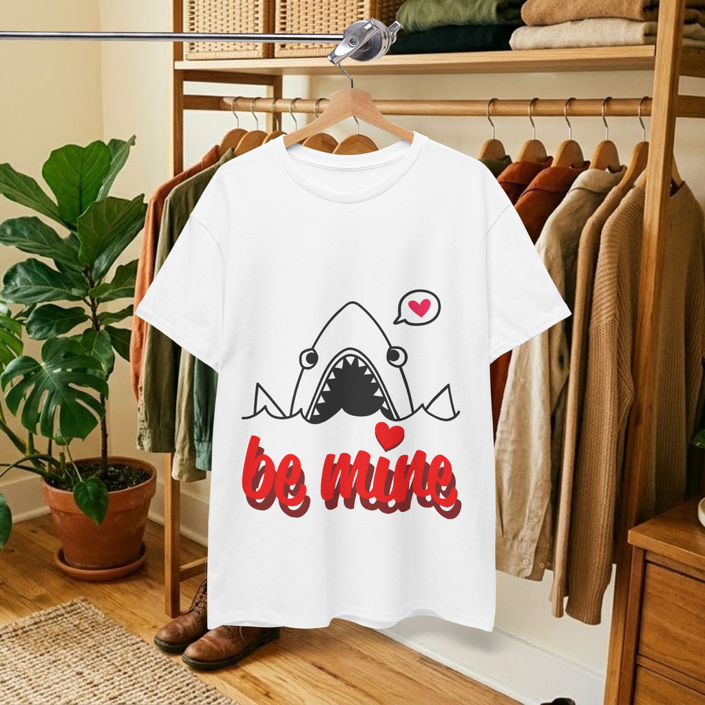 White T-shirt hanging in closet with shark illustration and red "be mine" hearts