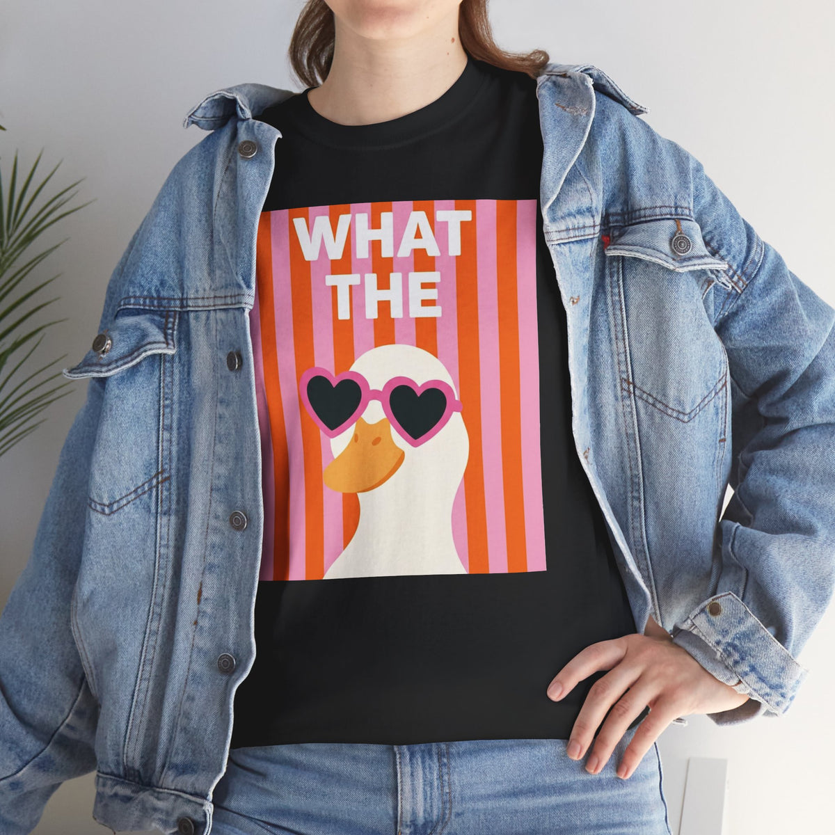 Black graphic cotton tee with "WHAT THE" heart sunglasses face graphic