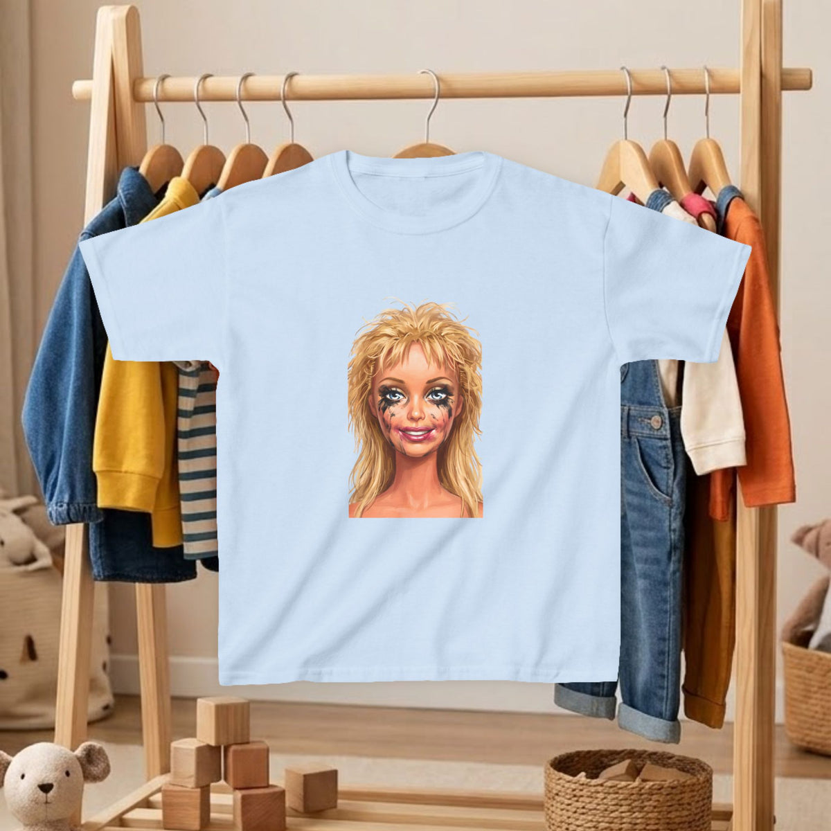 Kids' T-shirt in light blue with blonde doll portrait graphic on front