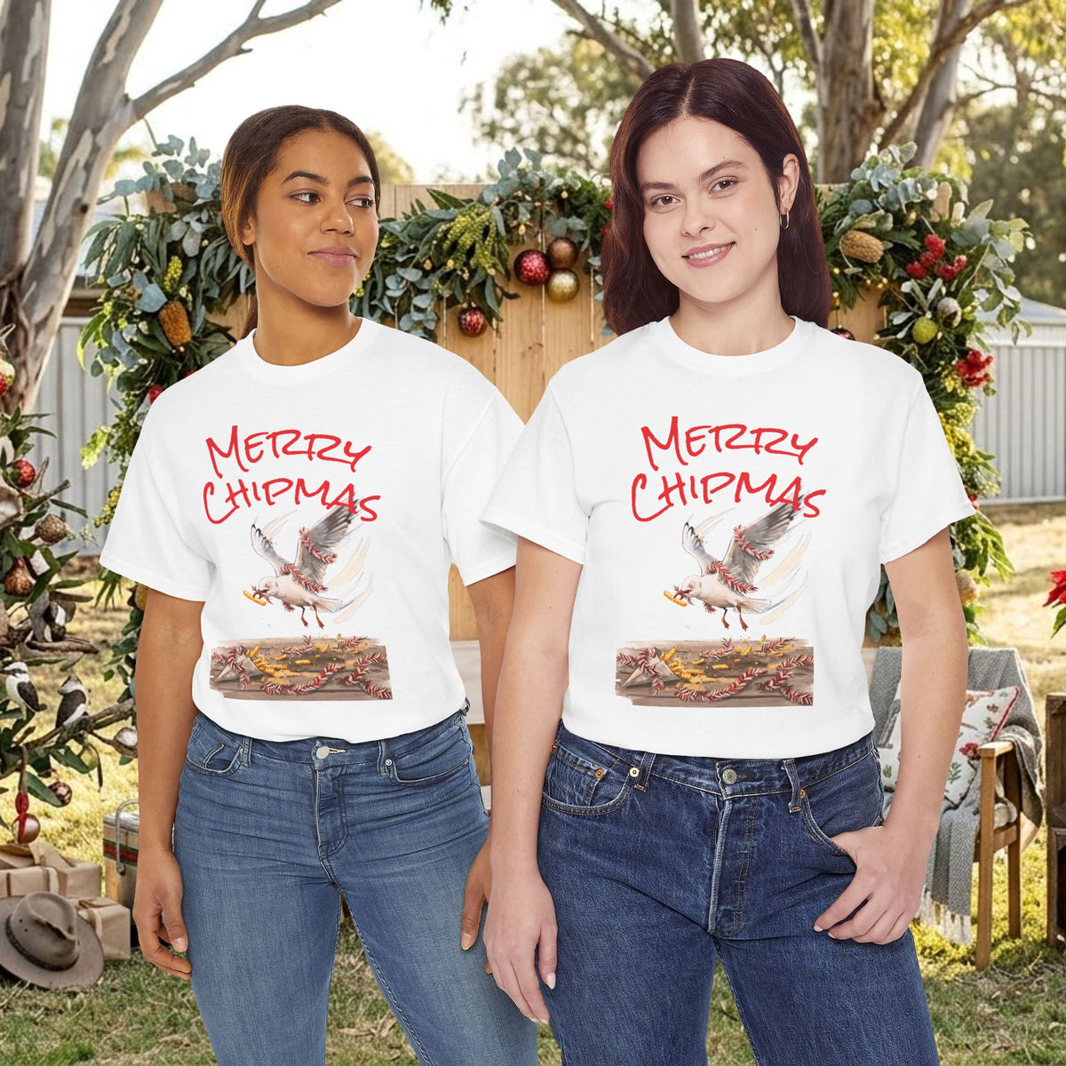 Two white Christmas graphic T-shirts with "Merry Chipmas" seagull illustration