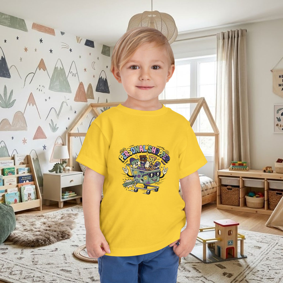 Yellow toddler t-shirt with colorful shopping cart graphic on front
