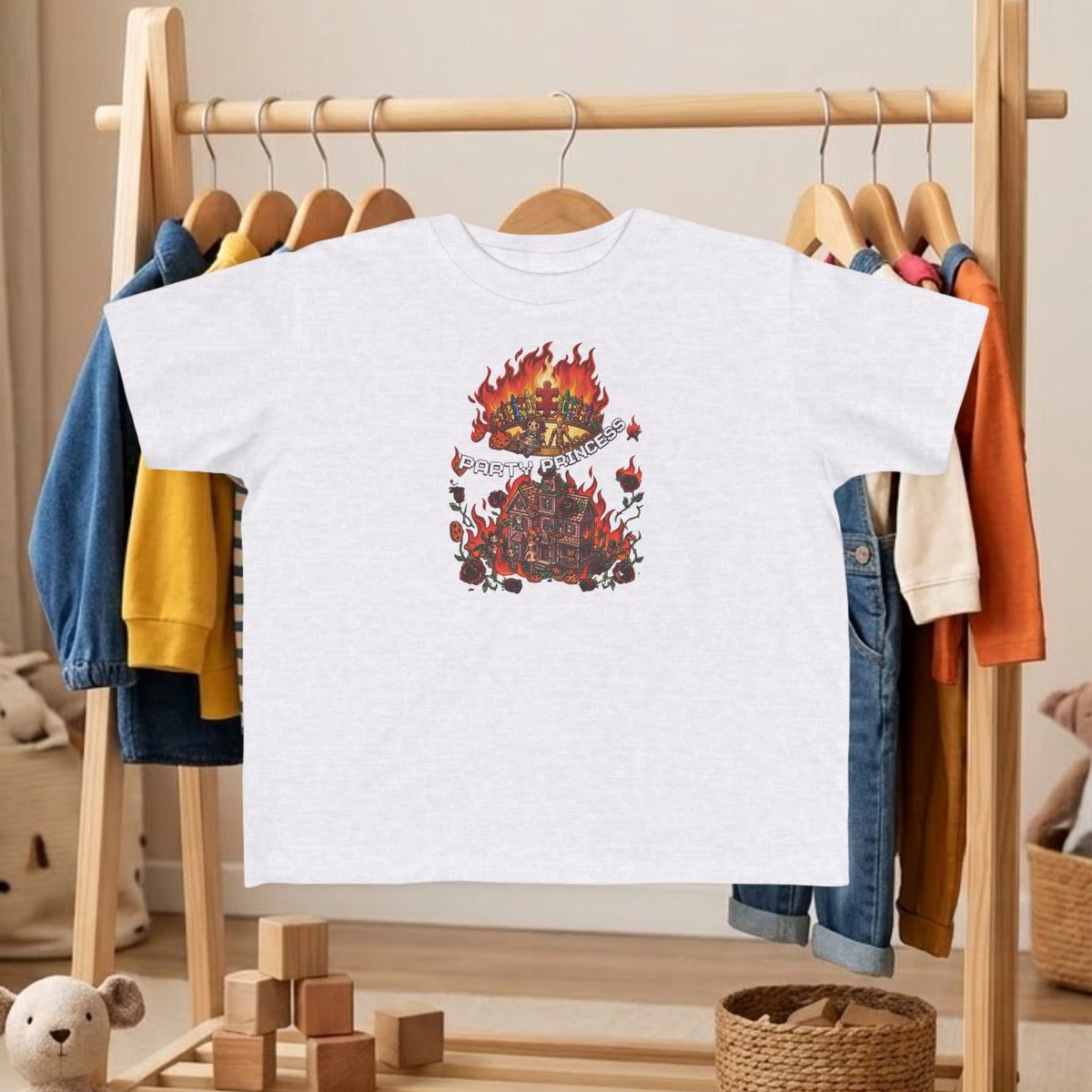 Toddler tee in white with colorful fire graphic centered on the chest