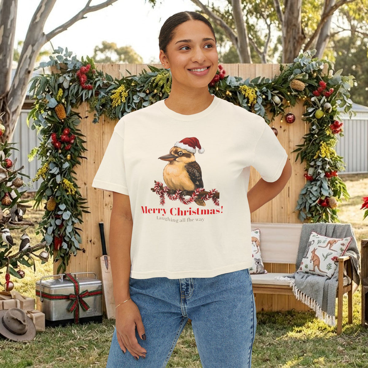 White t-shirt on model, Santa-hat bird with “Merry Christmas!” front graphic