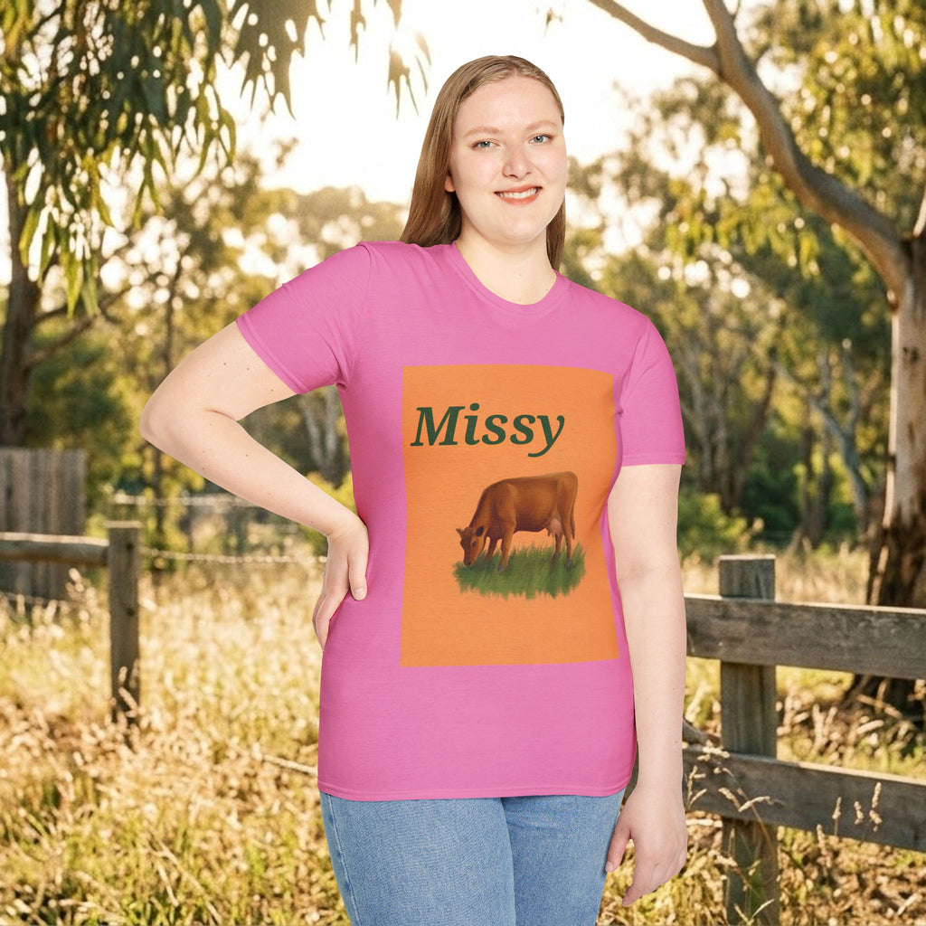 Pink cow graphic t-shirt with orange front square and grazing cow illustration