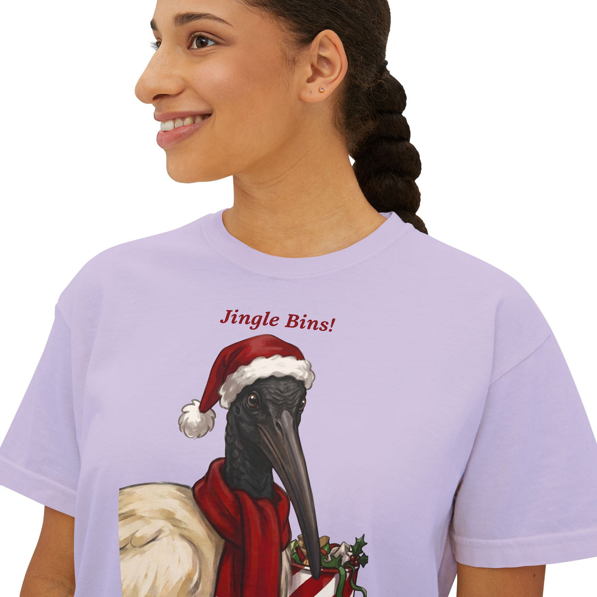 Lavender T-shirt close-up of 'Jingle Bins!' ibis in Santa hat graphic