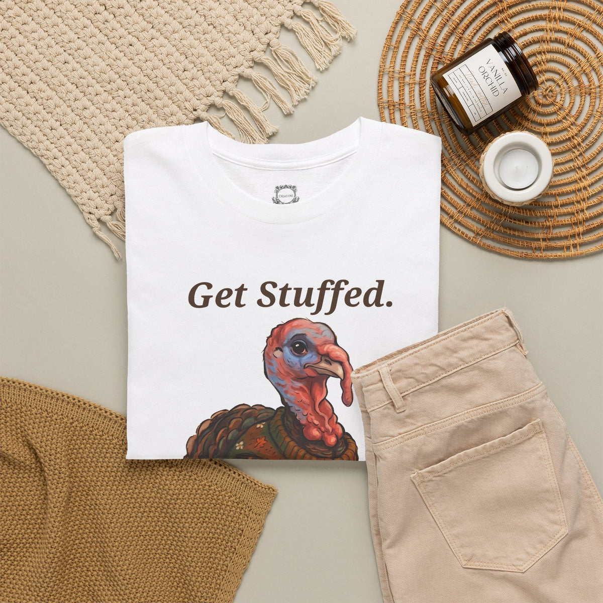 White Get Stuffed turkey graphic tee with “Get Stuffed.” text on the front