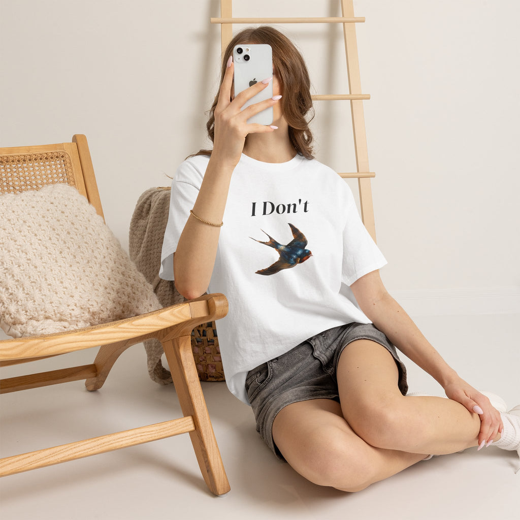 White graphic T-shirt with “I Don’t” text and bird illustration, crew neck short sleeves