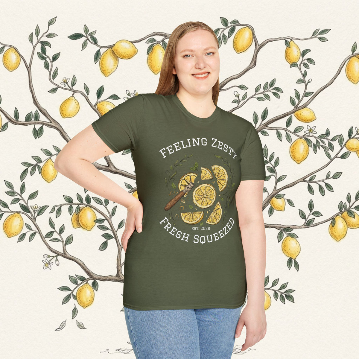 Olive green short-sleeve graphic tee with “FEELING ZESTY” and citrus slice artwork