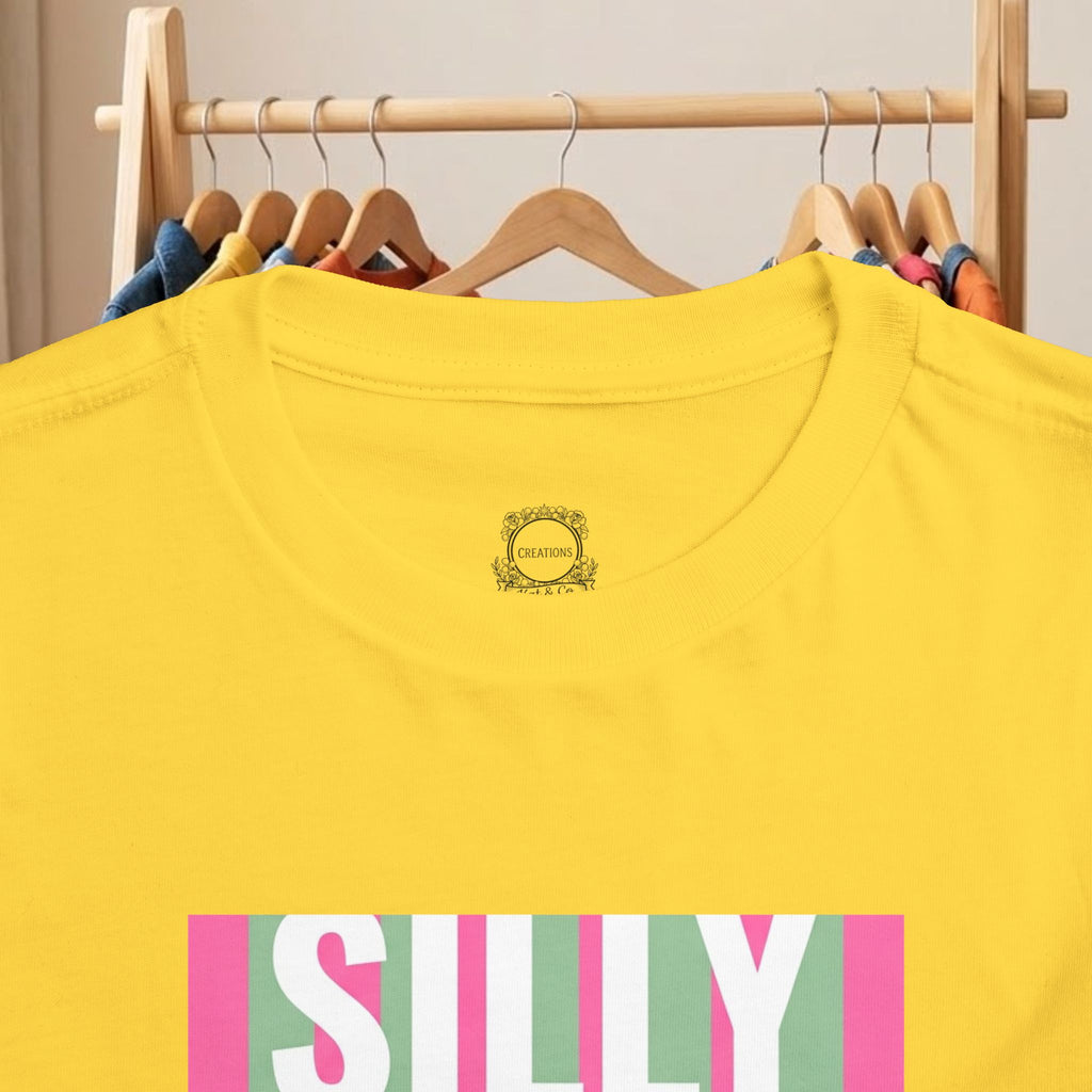 Toddler yellow T-shirt with small backneck logo and “SILLY” duck graphic detail