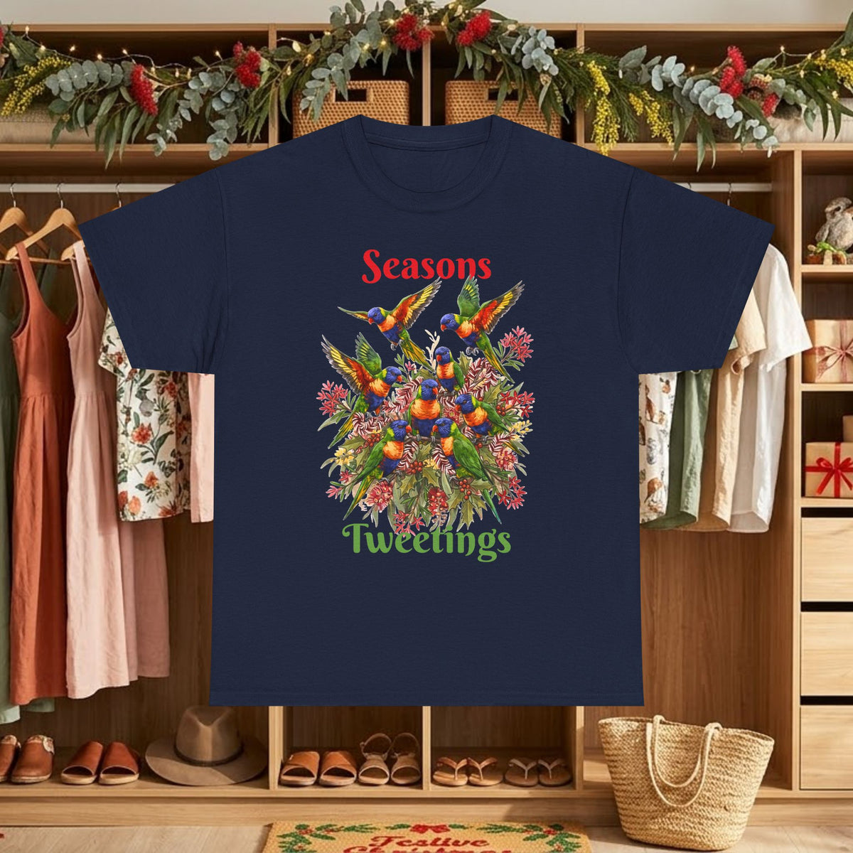 Navy T-shirt with colorful birds floral graphic and text "Seasons Tweettings"