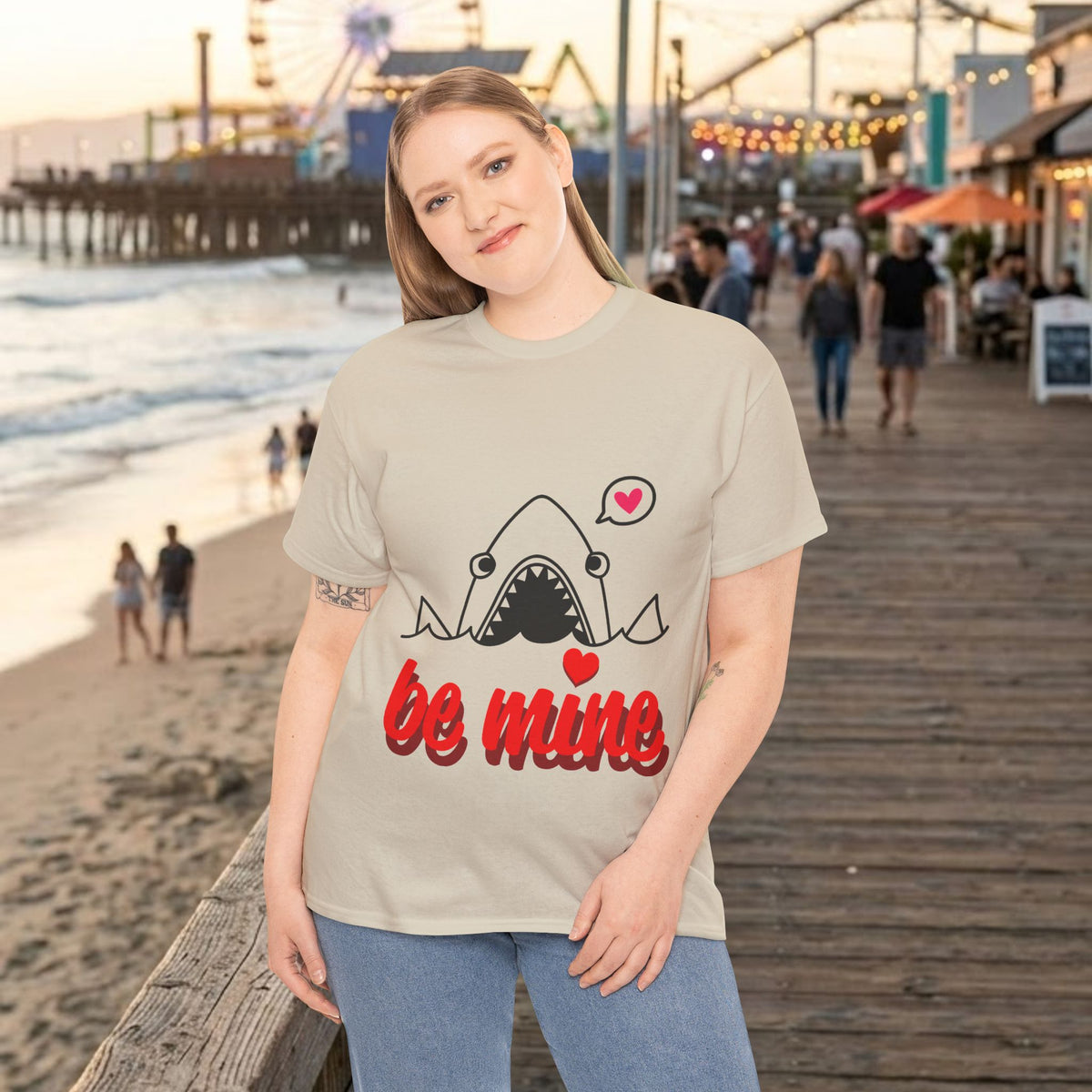 Natural T-shirt on model: shark graphic with heart eyes and red “be mine” text
